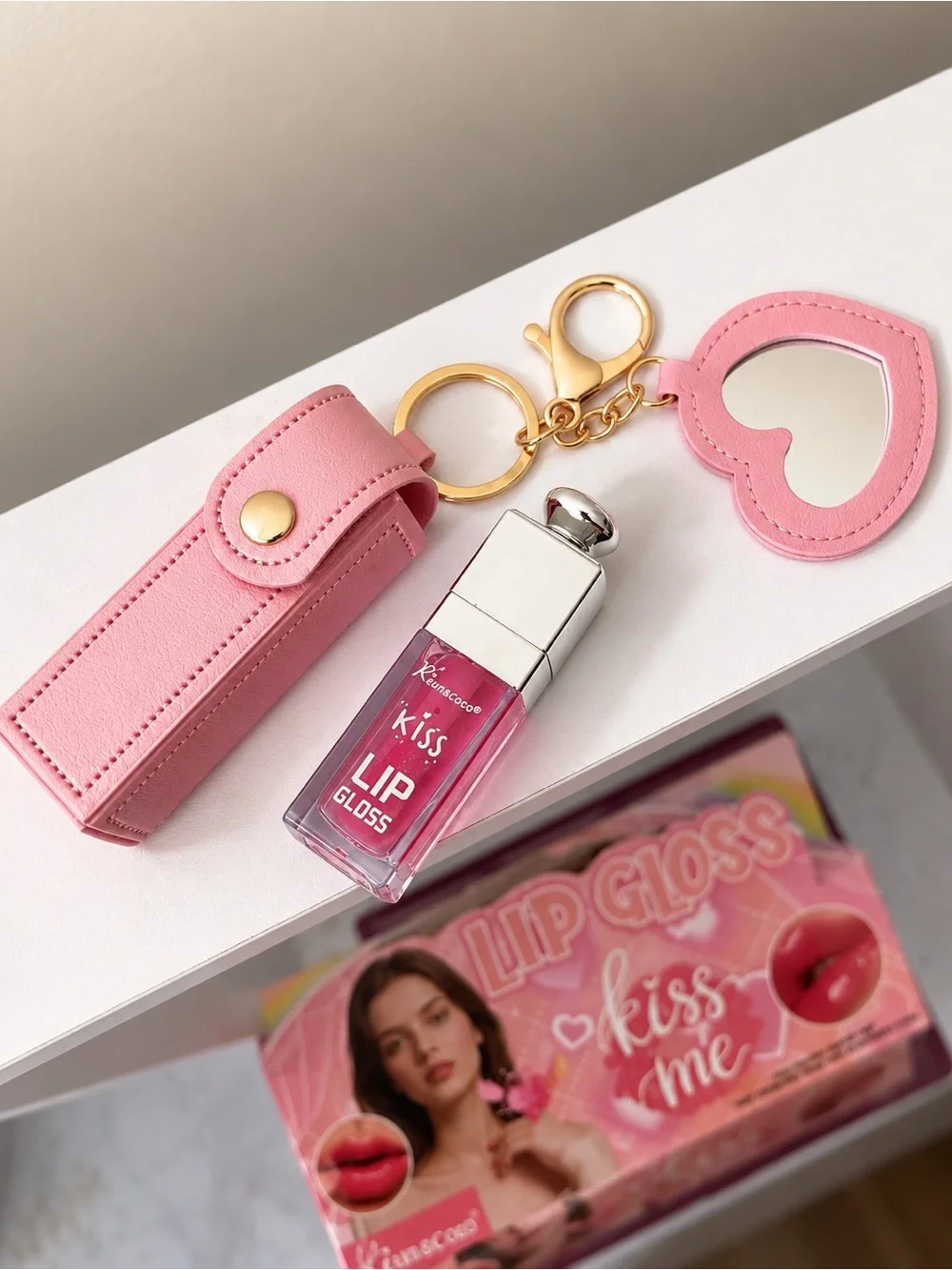 Kiss Lip Gloss – Pink High-Shine Lip Gloss by (unknown)